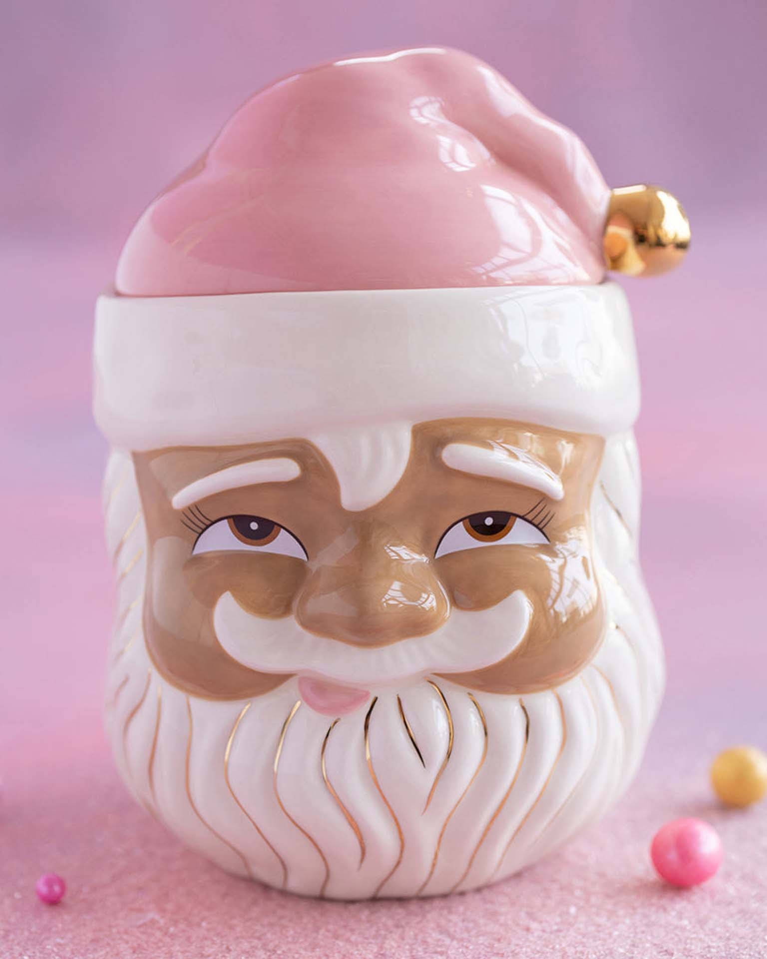 http://www.boutiquelittle.com/cdn/shop/files/little-glitterville-brown-papa-noel-cookie-jar-in-pink-45650371379492.jpg?v=1700687793