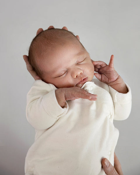 newborn suit with snaps in cream