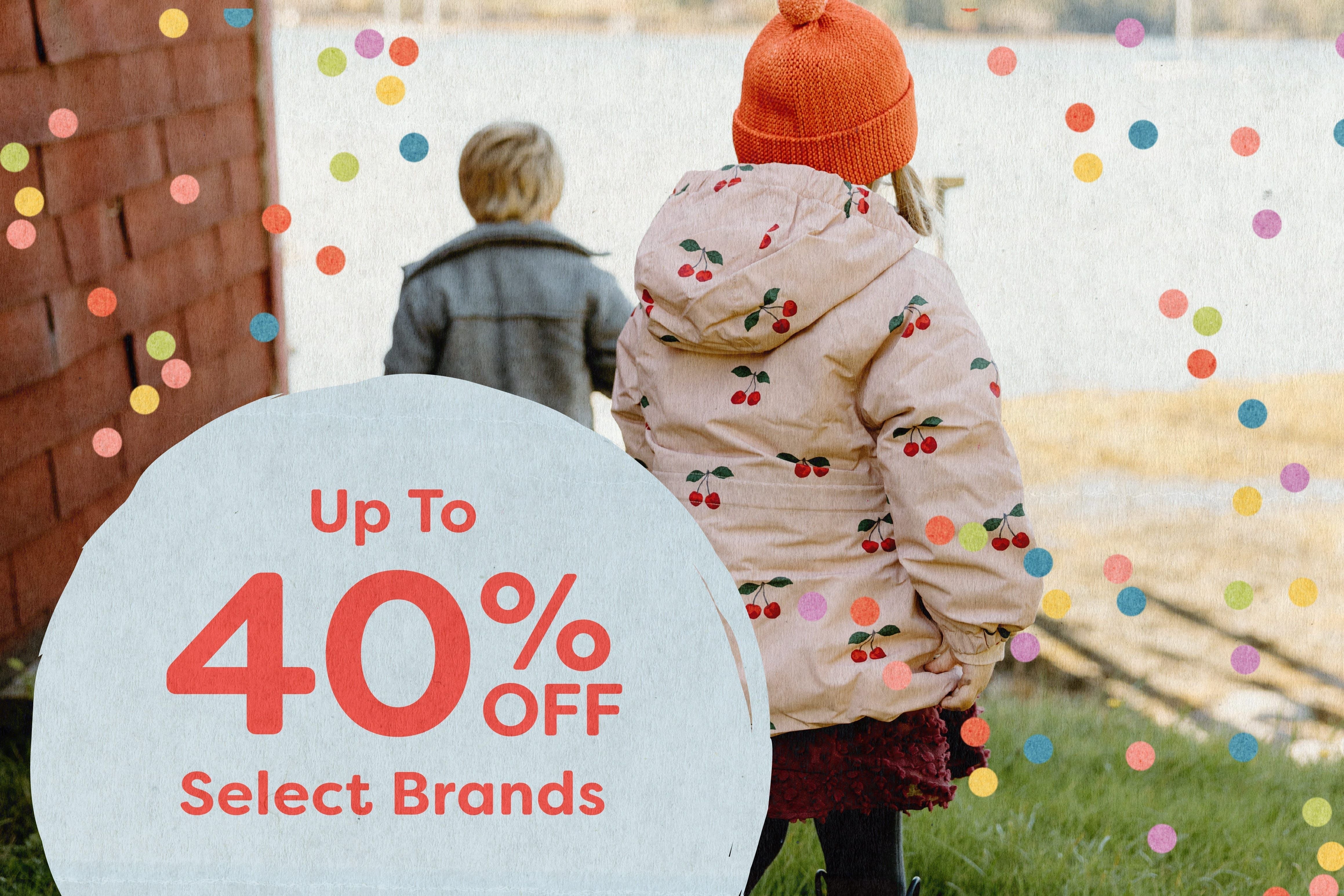 Children standing outside with colorful confetti overlay. Text on the image reads: "Up to 40% off select brands.