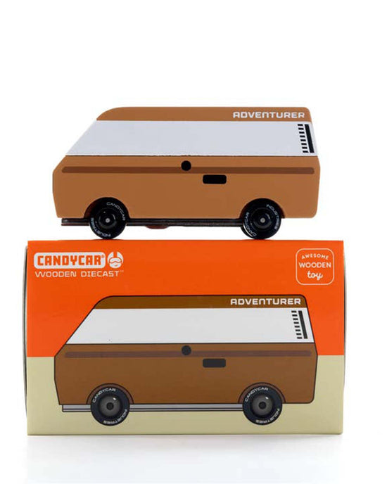 The "VW brown adventurer" by candylab is a wooden toy car inspired by the VW T3 Van, showcasing a sleek brown and white design, thoughtfully displayed atop its matching box to inspire your child's adventures.