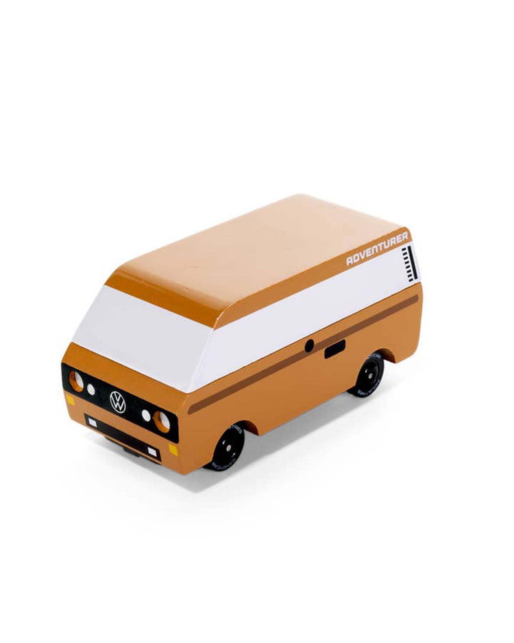 The VW brown adventurer by Candylab is a compact wooden toy van featuring a retro design in brown and white, inspired by the iconic VW T3 Van through the Candylab x VW collaboration, bringing nostalgia to life.