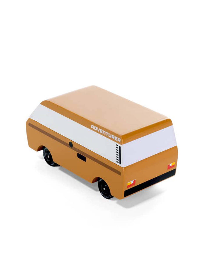 The "VW brown adventurer" by Candylab is a toy car inspired by the VW T3 Van, featuring a retro van design with a brown and white color scheme and sleek black wheels. It perfectly captures the nostalgia of classic journeys for those who cherish adventure.