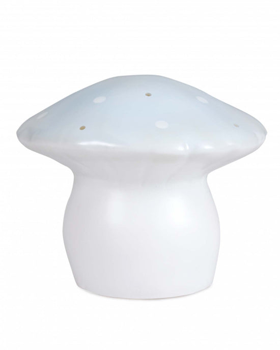 The Egmont medium mushroom light in blue is a charming white ceramic figurine with a light blue cap featuring white dots, perfect for adding a whimsical touch to any space.