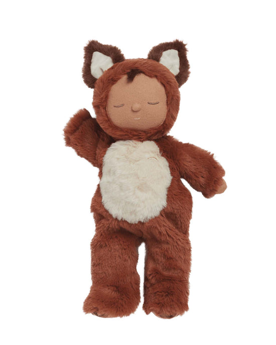 The cozy dinkum fox finnley by Olli Ella is a posable plush doll dressed in a charming brown and white fox costume, featuring closed eyes and extended arms.