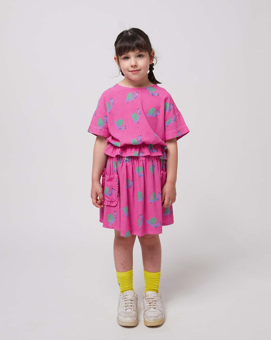 Little bobo choses kids funny snail all over woven blouse in fuchsia