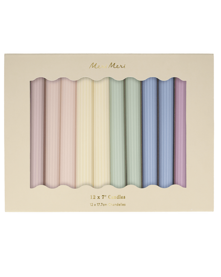 Set of twelve meri meri pastel table candles in a wavy arrangement on a pale background with the text "meri meri" and dimensions "12 x 7".